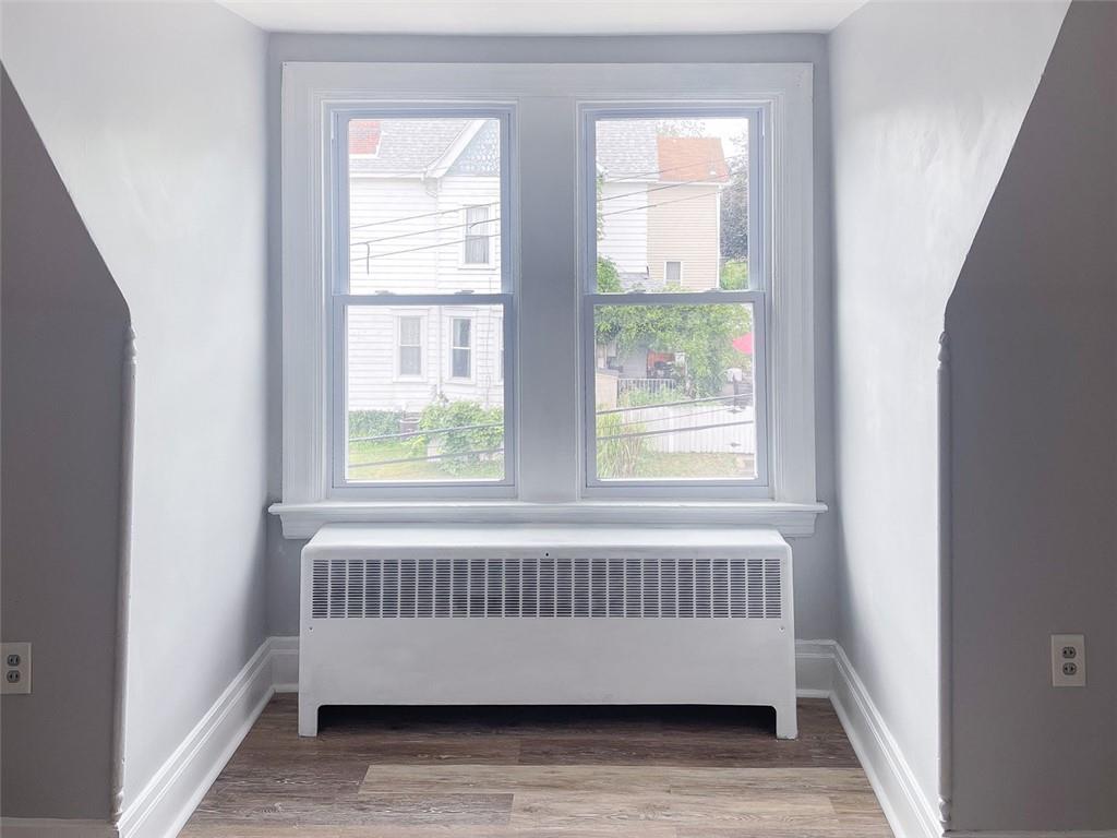 49 North Linwood Avenue Pittsburgh, PA 15205 - Photo 16 of 17 a view of bedroom with window and wooden floor