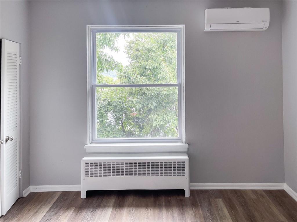 49 North Linwood Avenue Pittsburgh, PA 15205 - Photo 17 of 17 a view of a room with wooden floor and windows