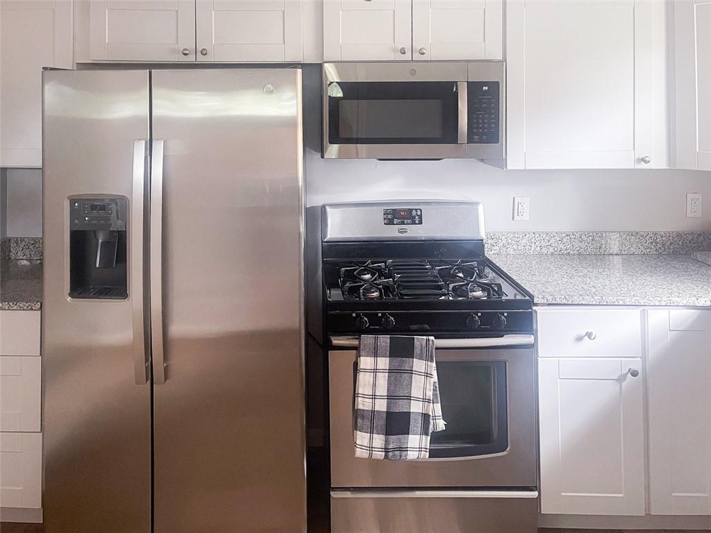 49 North Linwood Avenue Pittsburgh, PA 15205 - Photo 6 of 17 a kitchen with a stainless steel appliances and cabinets