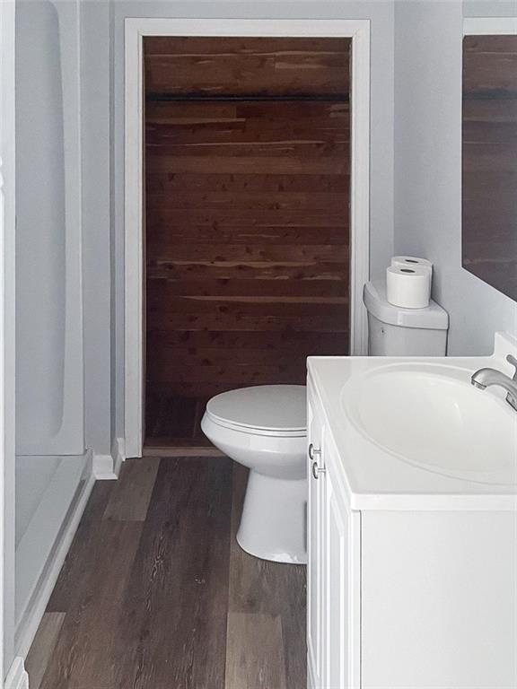 49 North Linwood Avenue Pittsburgh, PA 15205 - Photo 9 of 17 a bathroom with a toilet a sink and wooden floor