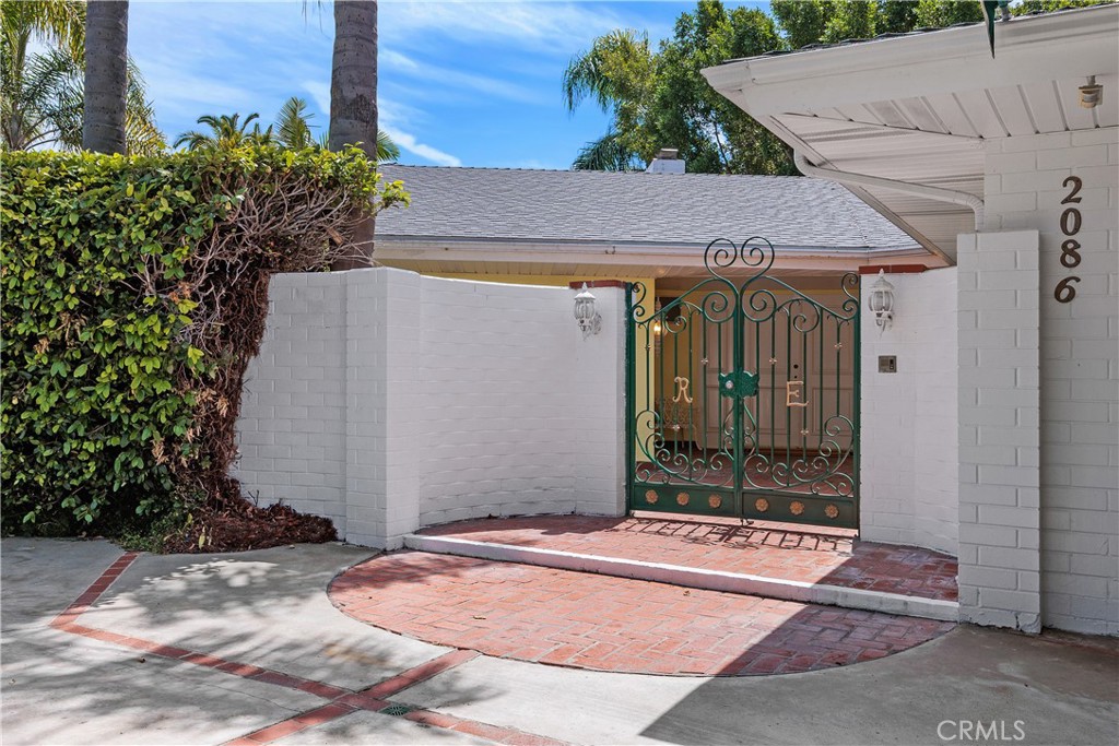 2086 Playa Road Carlsbad, CA 92009 - Photo 16 of 44 Gated Court Yard off the Circular Driveway as You Approach the Formal Enterance.