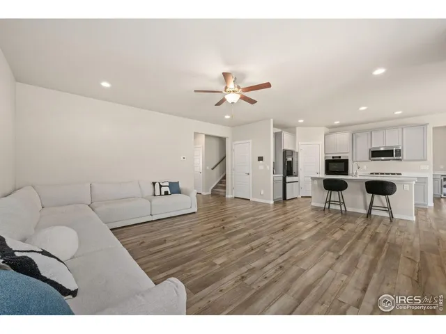 a living room with furniture and a table