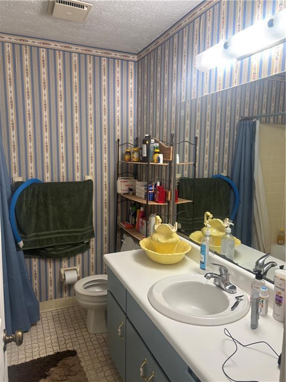 224 Abri Place Southwest Lilburn, GA 30047 - Photo 13 of 19 a bathroom with a sink and a mirror