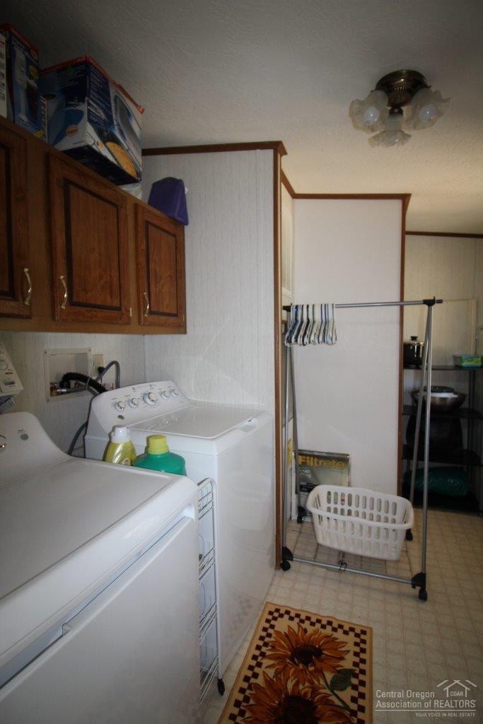 19235 Kiowa Road Bend, OR 97702 - Photo 15 of 25 a utility room with dryer and washer