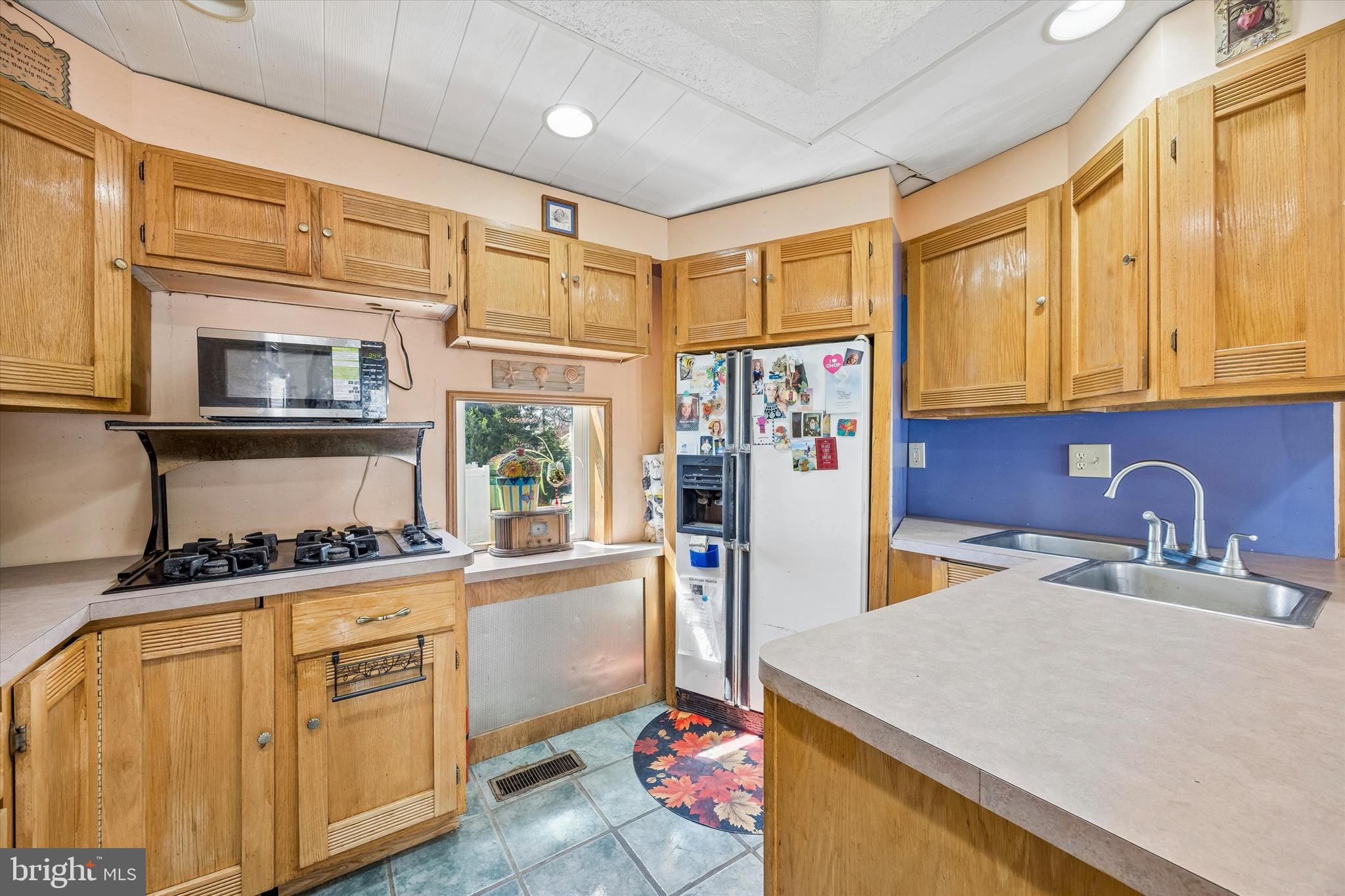 620 Gilbert Road Ridley Park, PA 19078 - Photo 14 of 35 a kitchen with stainless steel appliances granite countertop a sink a stove and refrigerator