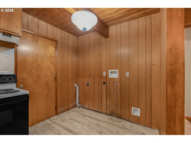 a view of an empty room with windows