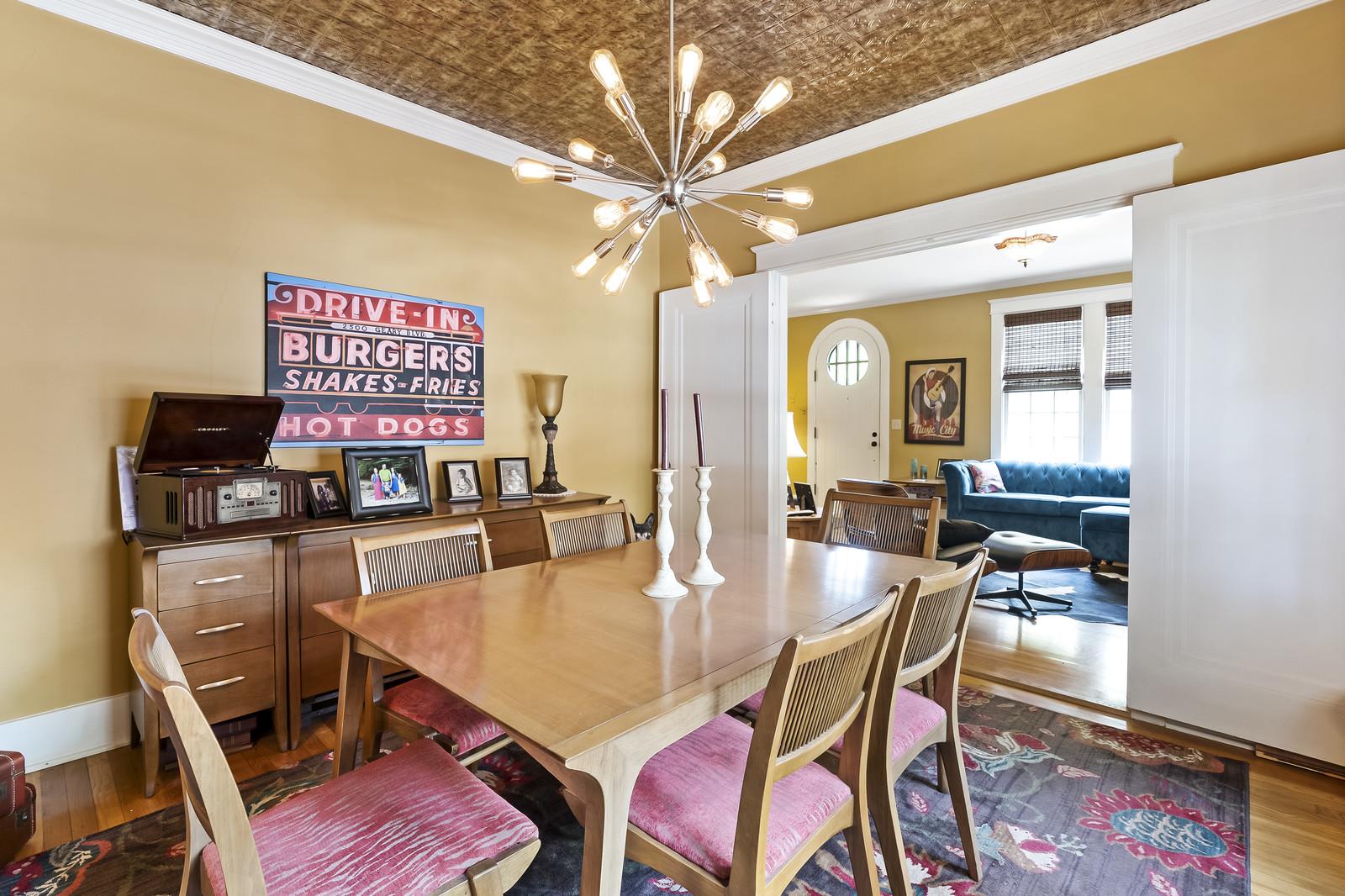 403 North Garner Street Springfield, TN 37172 - Photo 11 of 29 a dining room with furniture and wooden floor