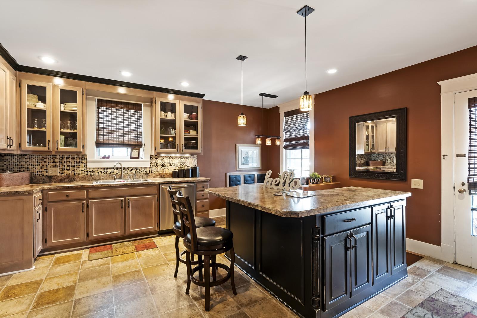 403 North Garner Street Springfield, TN 37172 - Photo 12 of 29 a kitchen with center island table and chairs