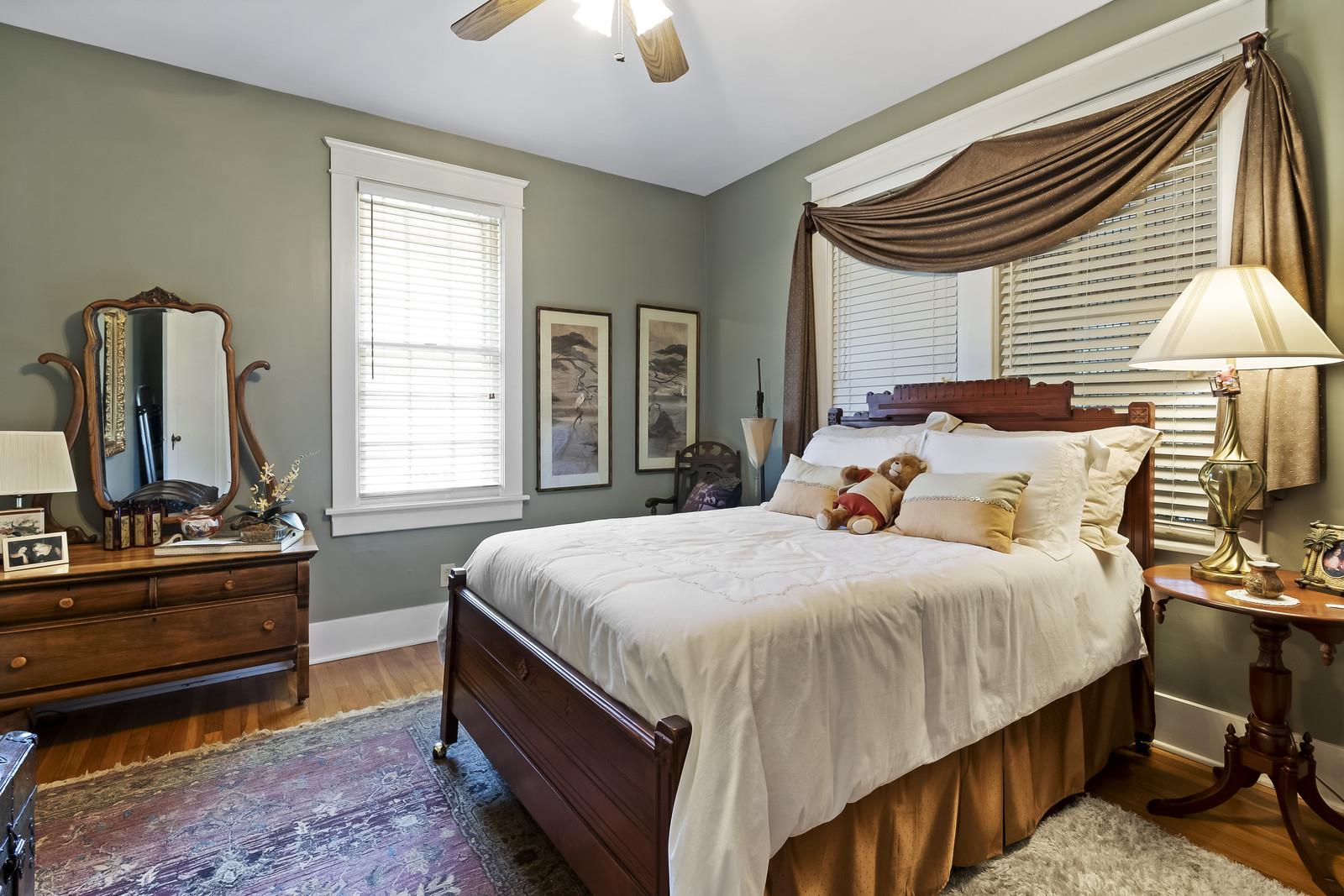 403 North Garner Street Springfield, TN 37172 - Photo 17 of 29 a bedroom with a bed table and window