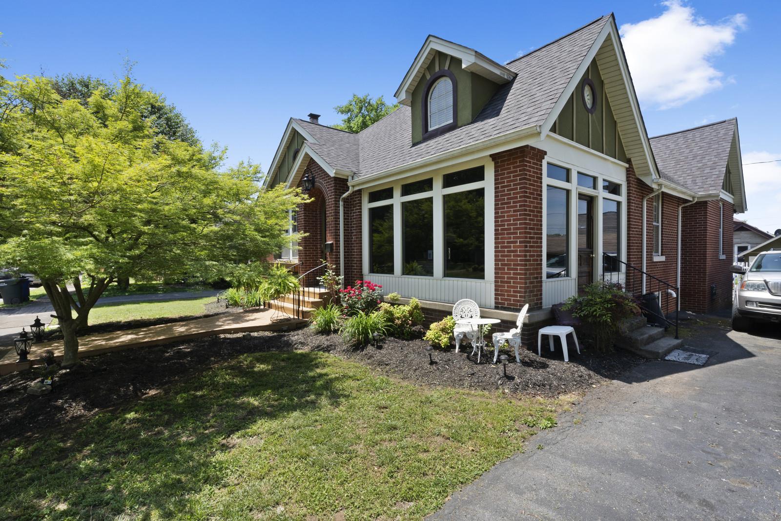403 North Garner Street Springfield, TN 37172 - Photo 2 of 29 a front view of a house with garden