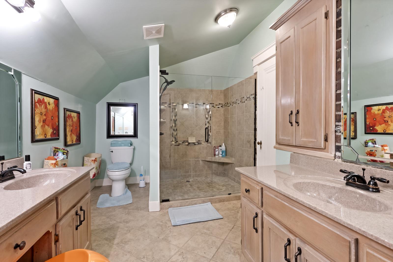 403 North Garner Street Springfield, TN 37172 - Photo 23 of 29 a spacious bathroom with a granite countertop sink mirror and double