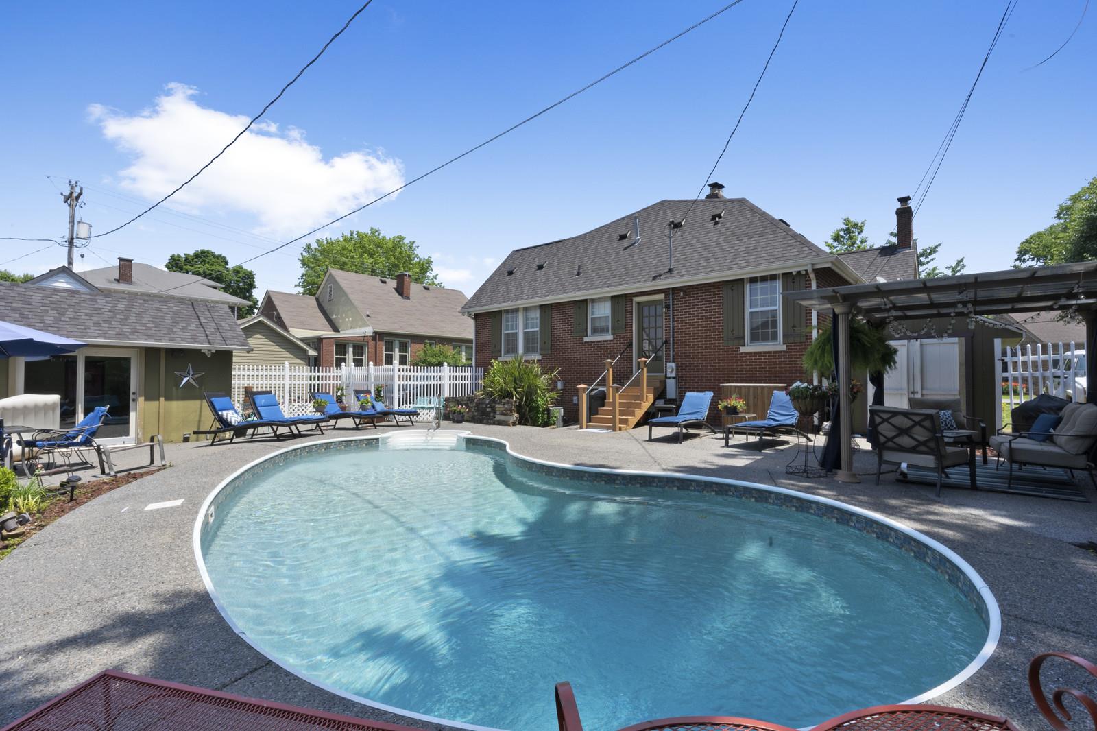 403 North Garner Street Springfield, TN 37172 - Photo 3 of 29 a view of a house with swimming pool and sitting area