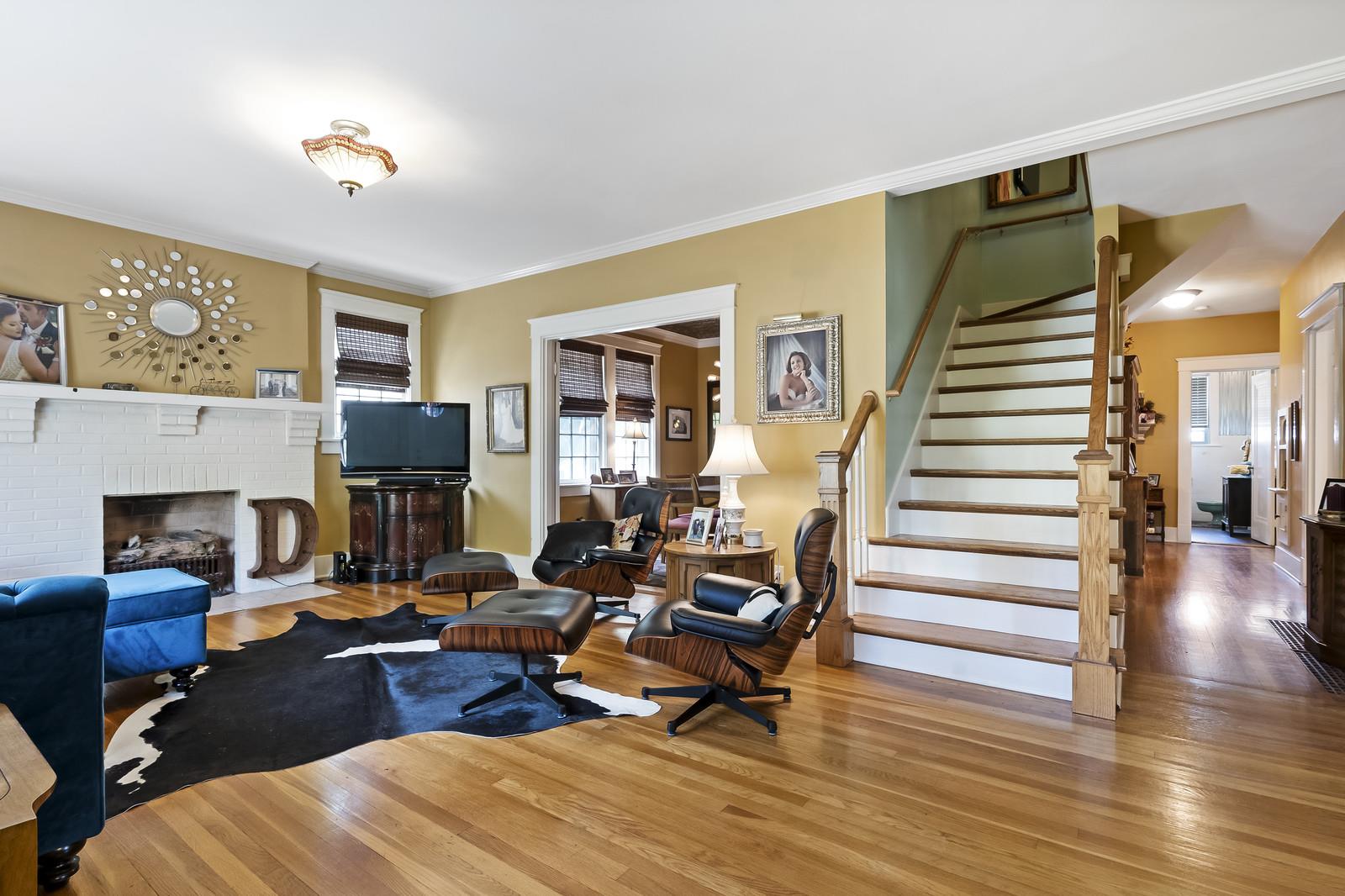 403 North Garner Street Springfield, TN 37172 - Photo 8 of 29 a living room with fireplace furniture and a wooden floor