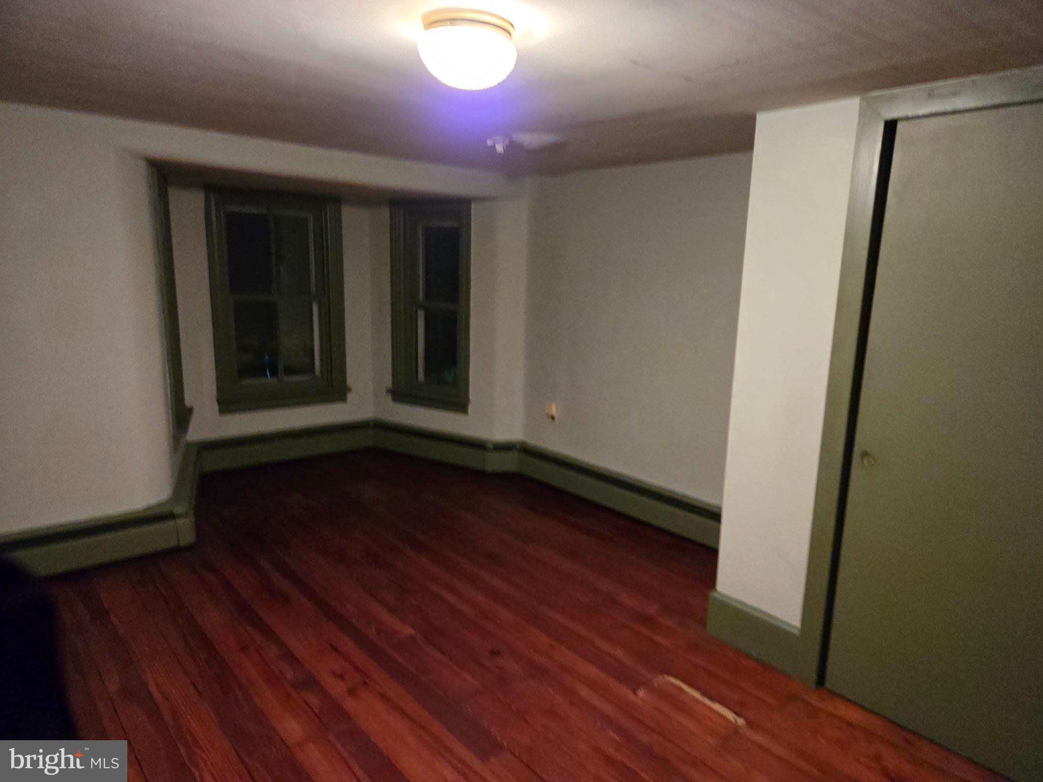 6 Township Line Road Line Lexington, PA 18932 - Photo 21 of 43 a view of a room with wooden floor and window