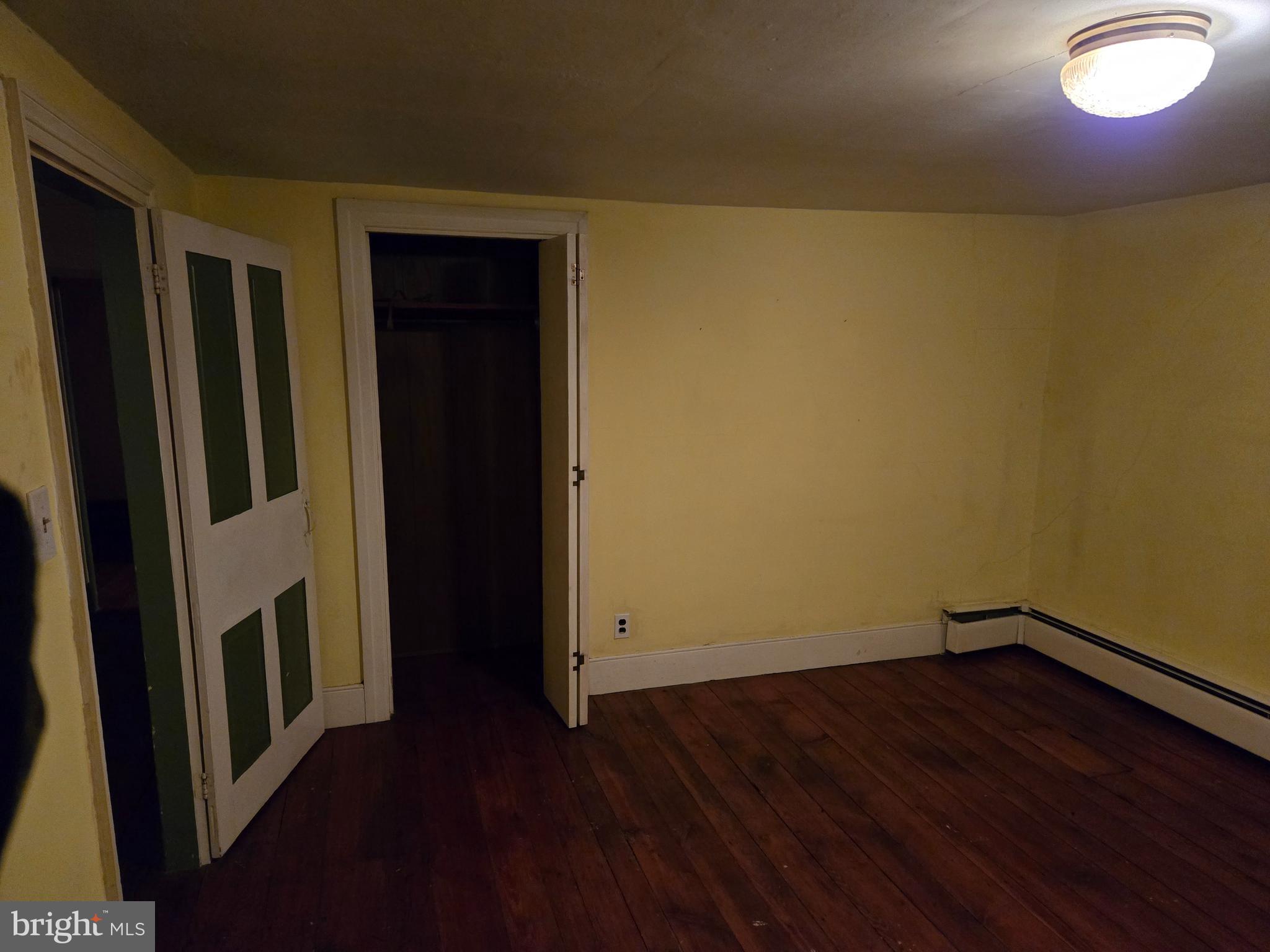 6 Township Line Road Line Lexington, PA 18932 - Photo 25 of 43 an empty room with wooden floor and windows