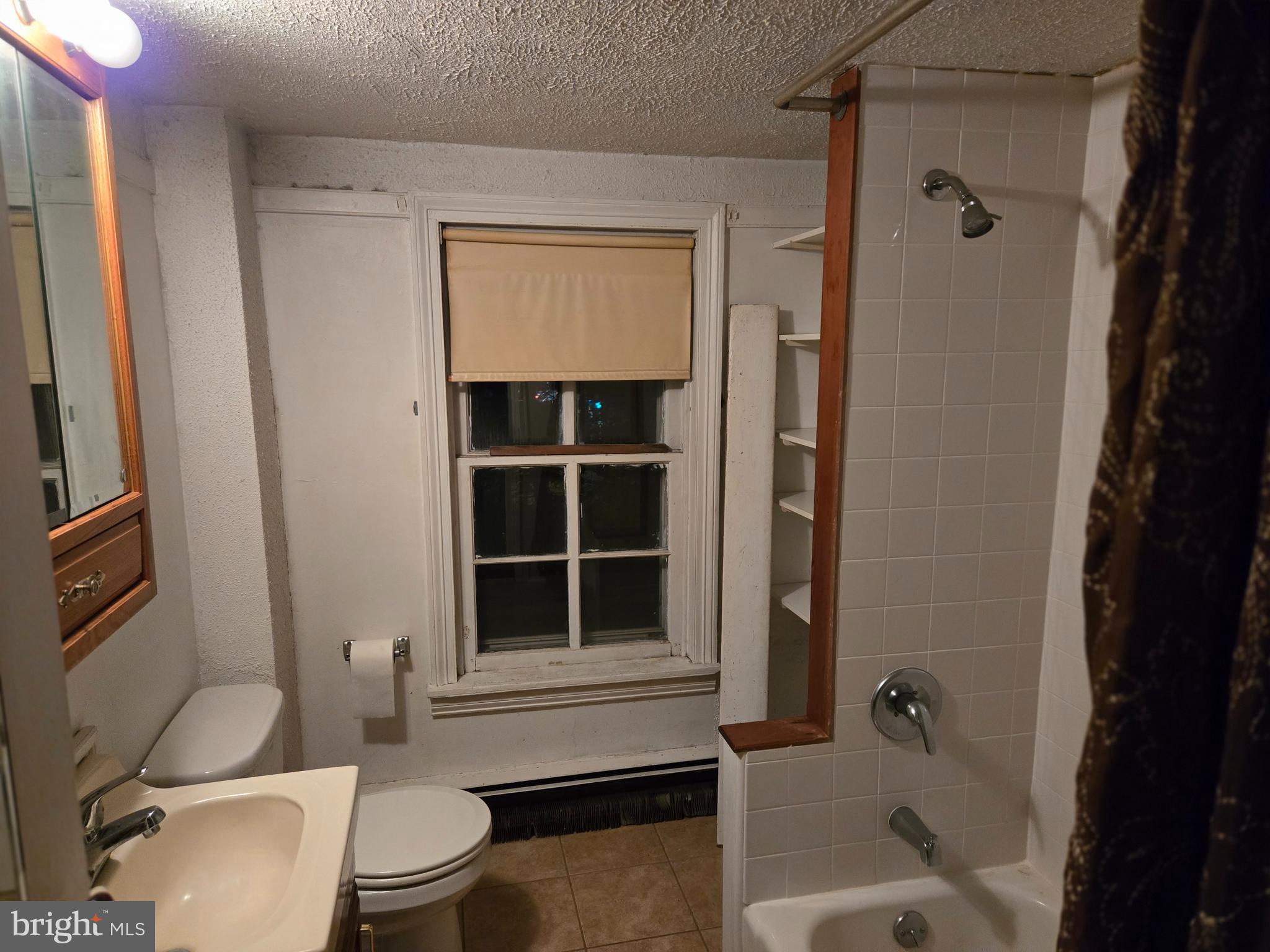 6 Township Line Road Line Lexington, PA 18932 - Photo 26 of 43 a bathroom with a toilet a sink and a bathtub