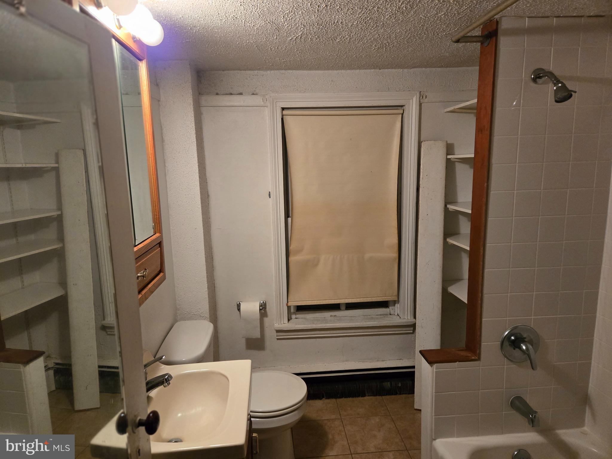 6 Township Line Road Line Lexington, PA 18932 - Photo 27 of 43 a bathroom with a toilet a sink and a bathtub