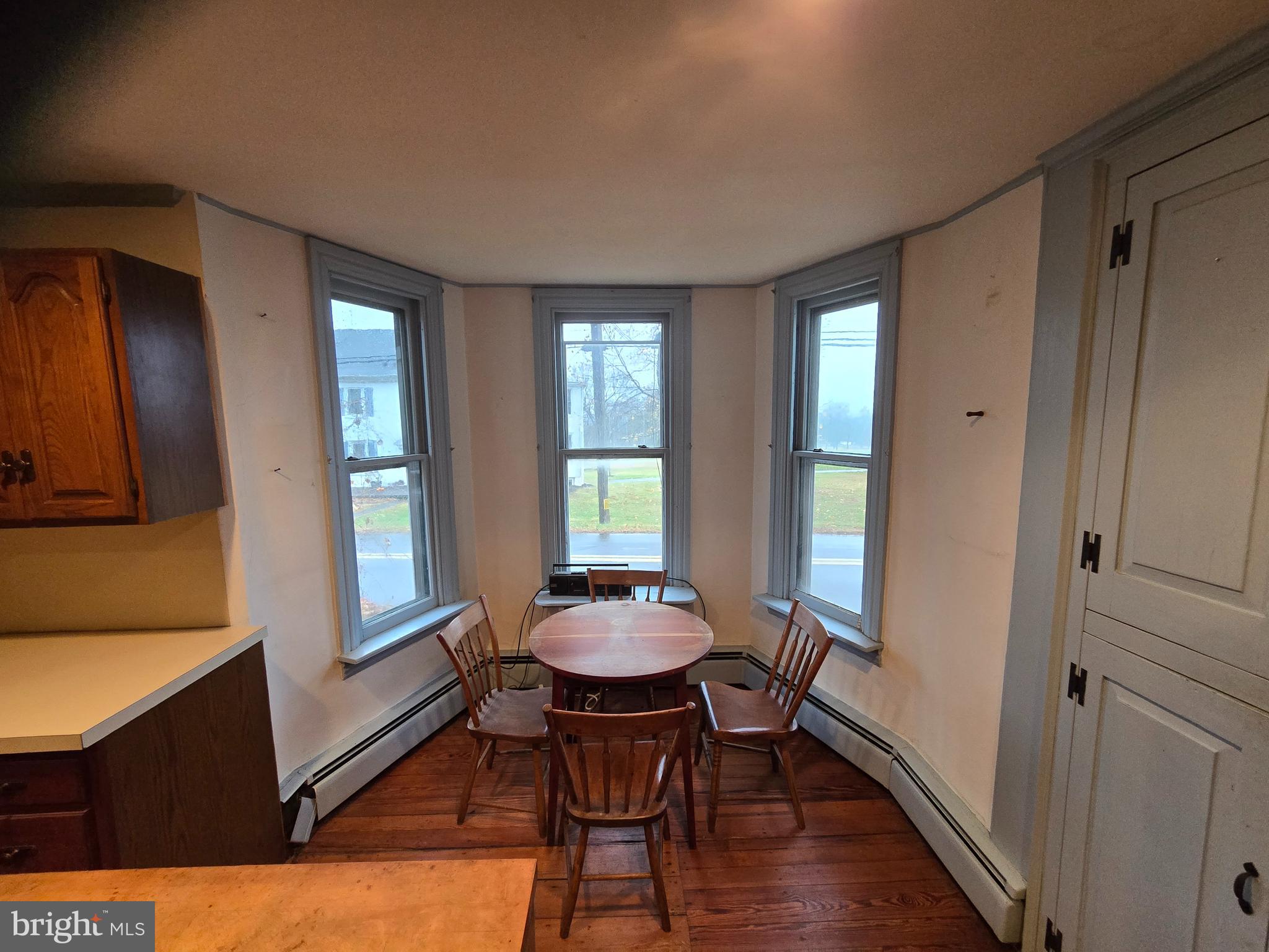 6 Township Line Road Line Lexington, PA 18932 - Photo 4 of 43 a view of a dining room with furniture window and wooden floor