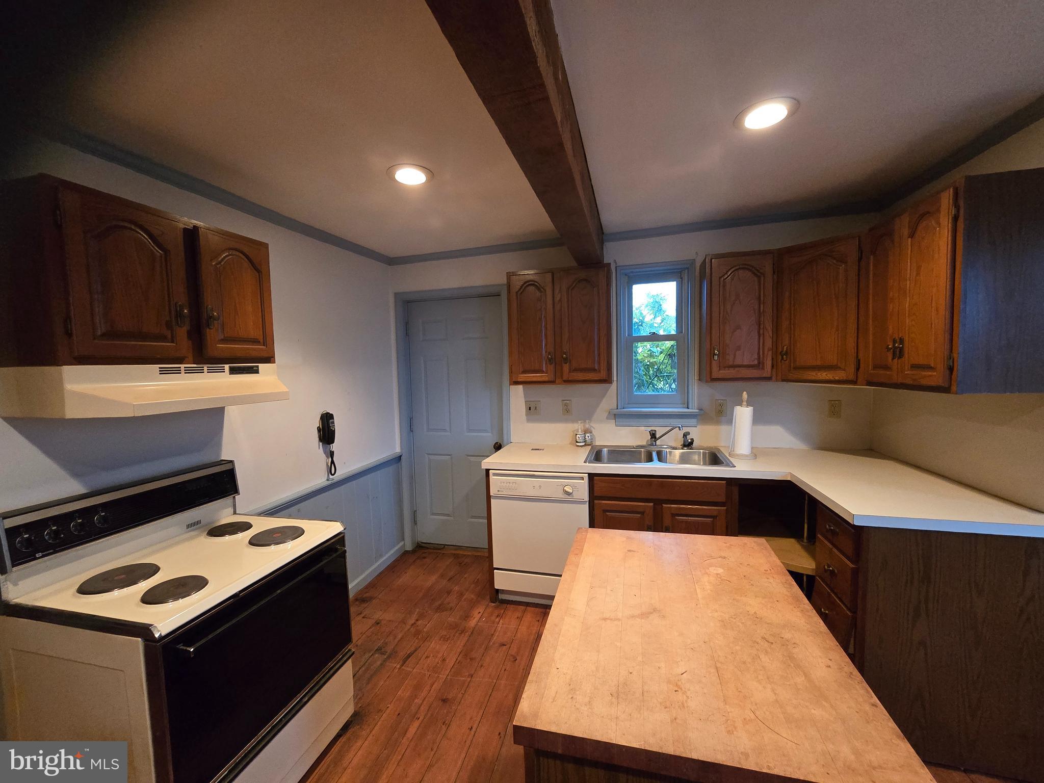 6 Township Line Road Line Lexington, PA 18932 - Photo 5 of 43 a kitchen with a stove and a sink