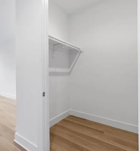 a view of small space with wooden floor