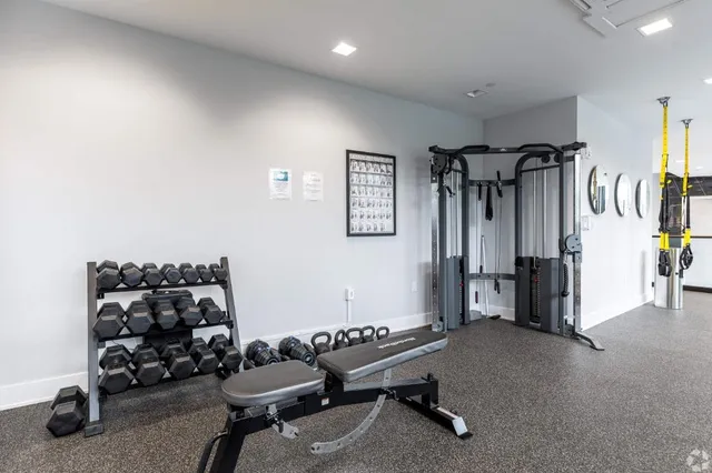 a livingroom with window and a couch