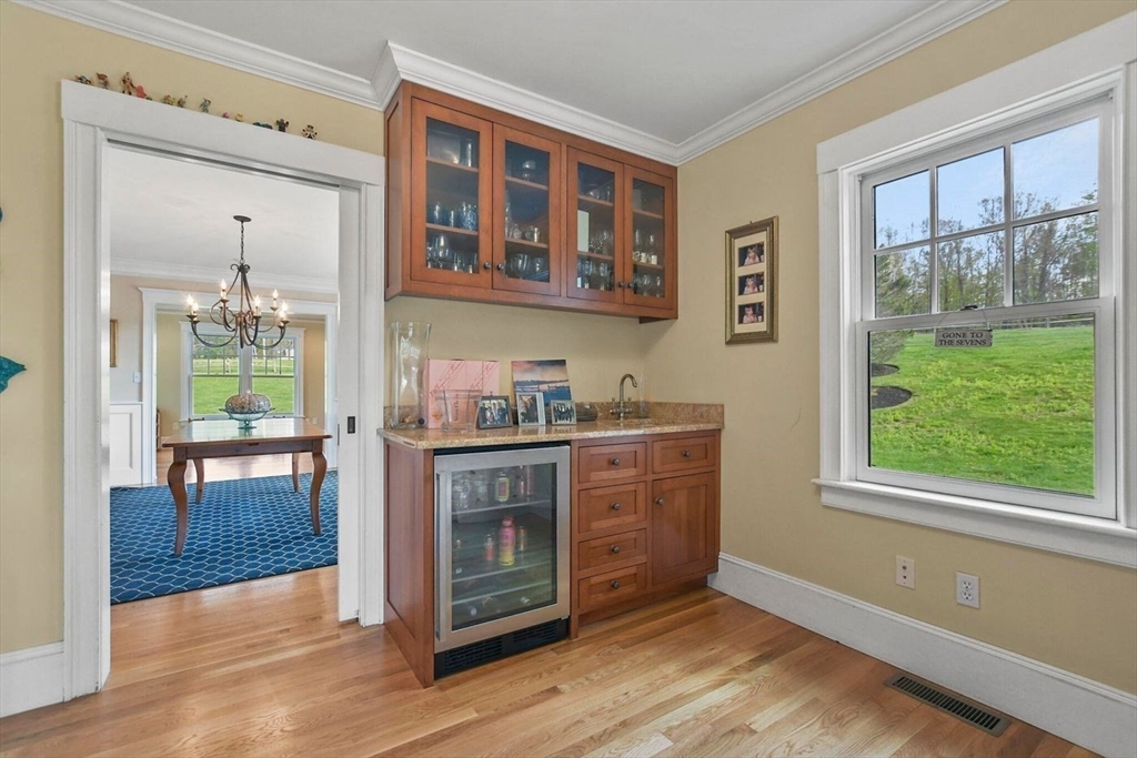 29 River Road Topsfield, MA 01983 - Photo 11 of 31 a kitchen with stainless steel appliances granite countertop a stove and a sink