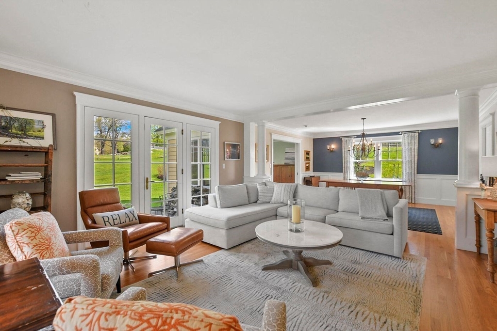 29 River Road Topsfield, MA 01983 - Photo 13 of 31 a living room with furniture and a large window