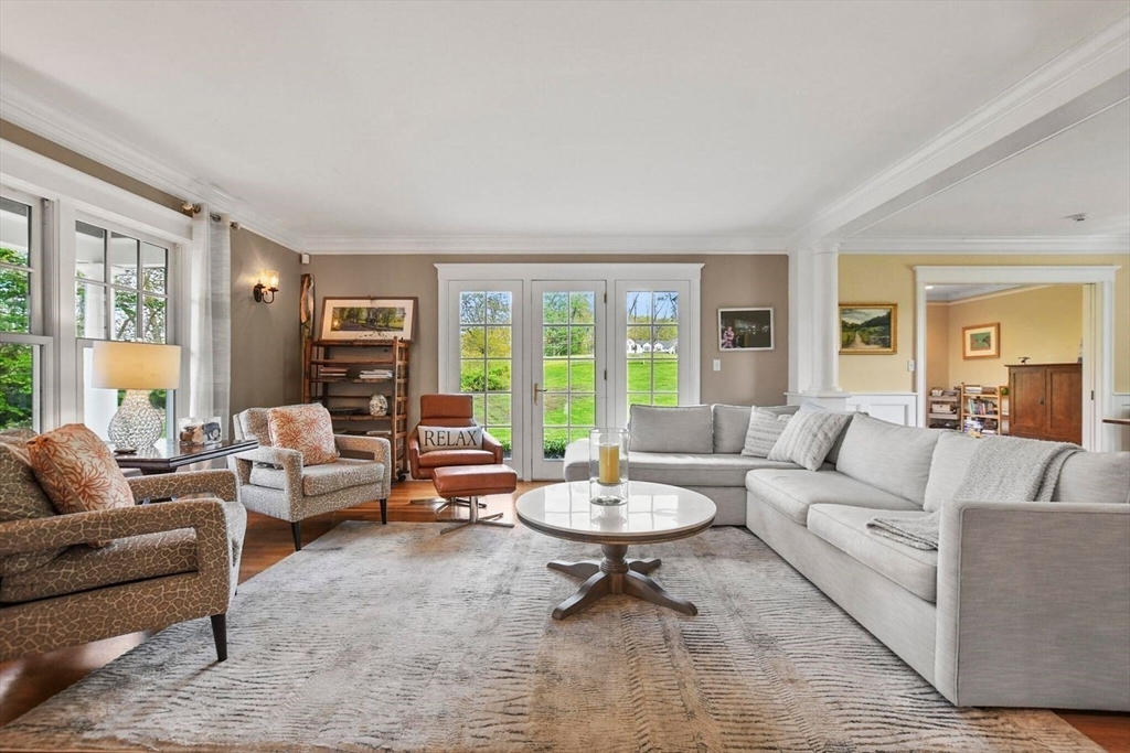 29 River Road Topsfield, MA 01983 - Photo 14 of 31 a living room with furniture and a large window