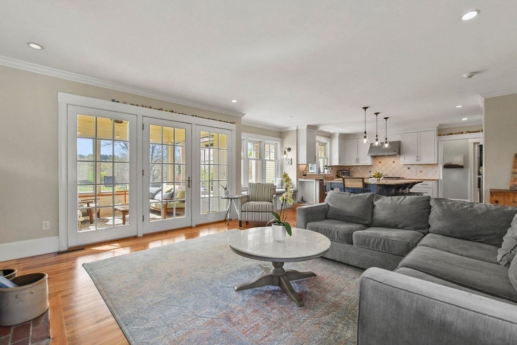 29 River Road Topsfield, MA 01983 - Photo 15 of 31 a living room with furniture and a table