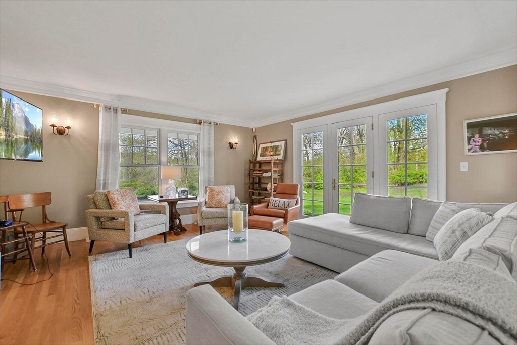 29 River Road Topsfield, MA 01983 - Photo 16 of 31 a living room with furniture and a large window