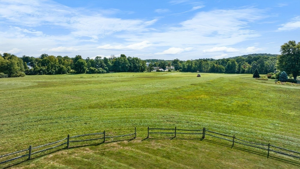 29 River Road Topsfield, MA 01983 - Photo 2 of 31 a view of an ocean from a yard
