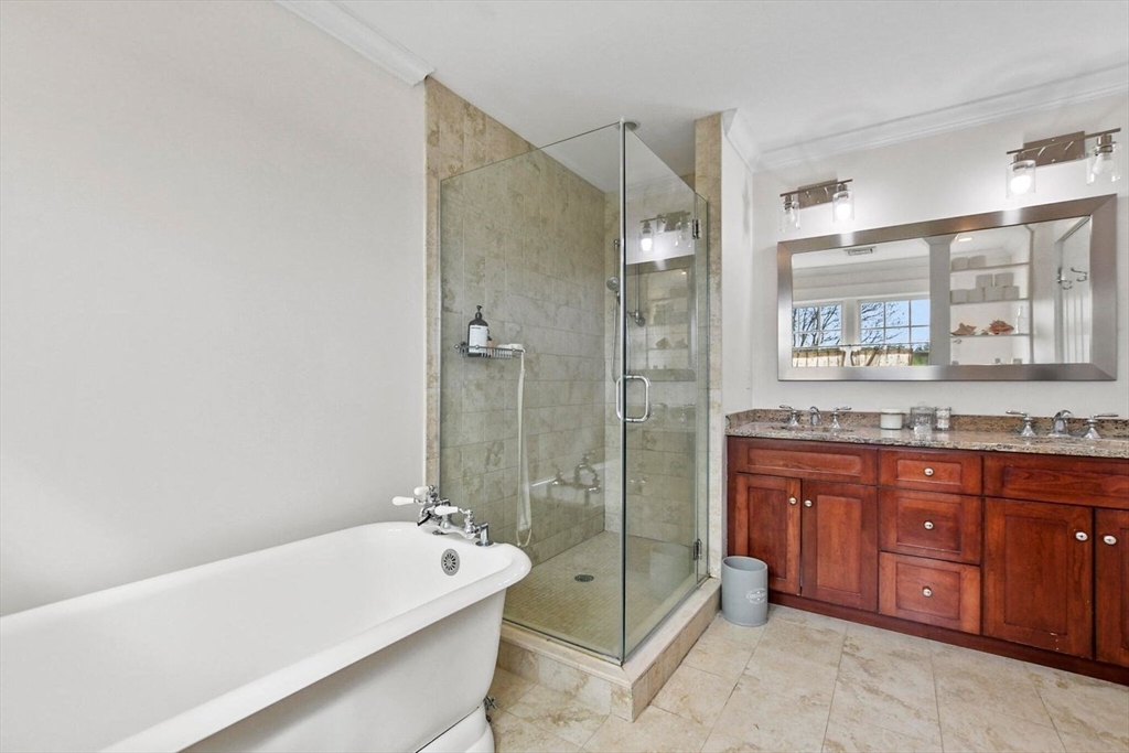 29 River Road Topsfield, MA 01983 - Photo 22 of 31 a bathroom with a tub sink double vanity and a shower