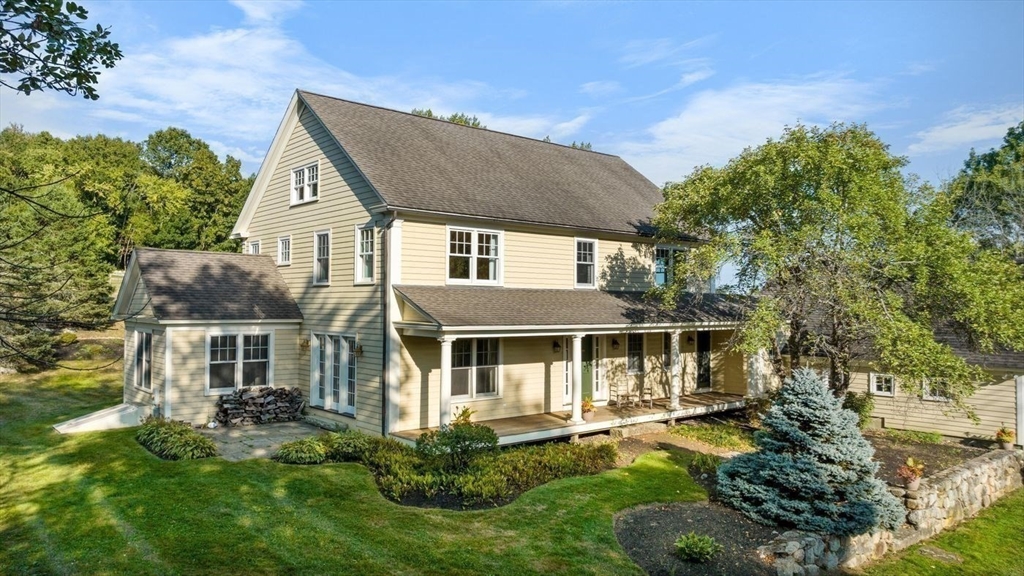 29 River Road Topsfield, MA 01983 - Photo 8 of 31 front view of a house with a yard