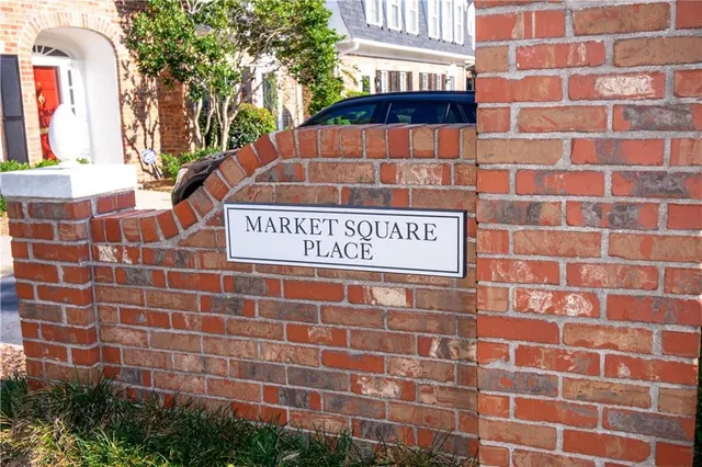 a view of a building with a sign board
