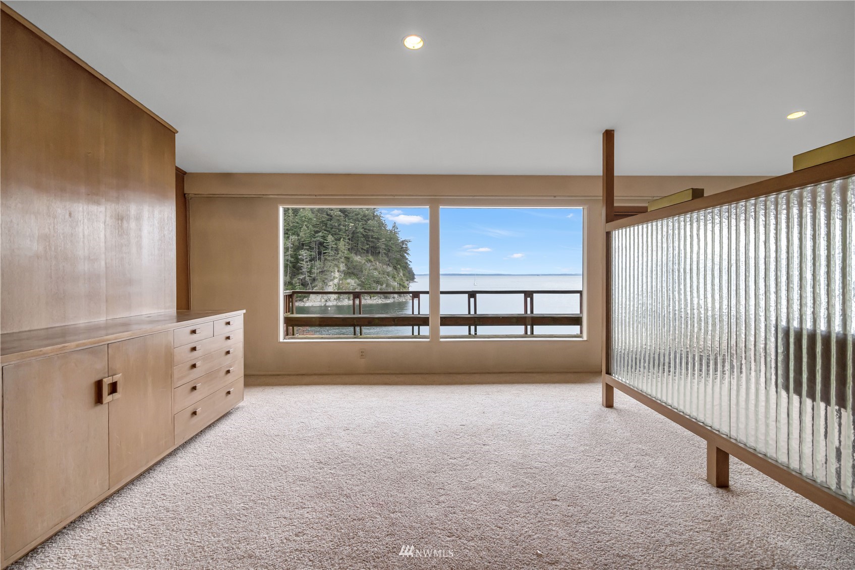 591 Pleasant Bay Road Bellingham, WA 98229 - Photo 11 of 40 a view of an empty room with a window