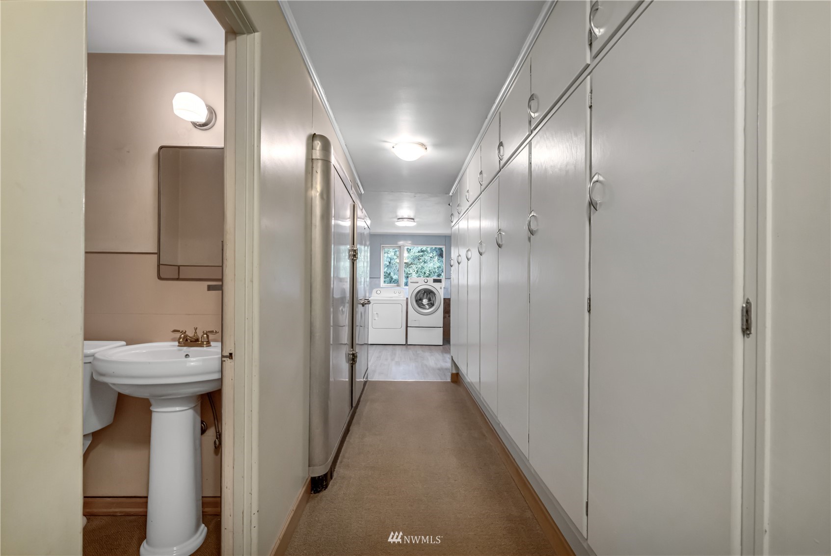 591 Pleasant Bay Road Bellingham, WA 98229 - Photo 12 of 40 a bathroom with a sink and mirror