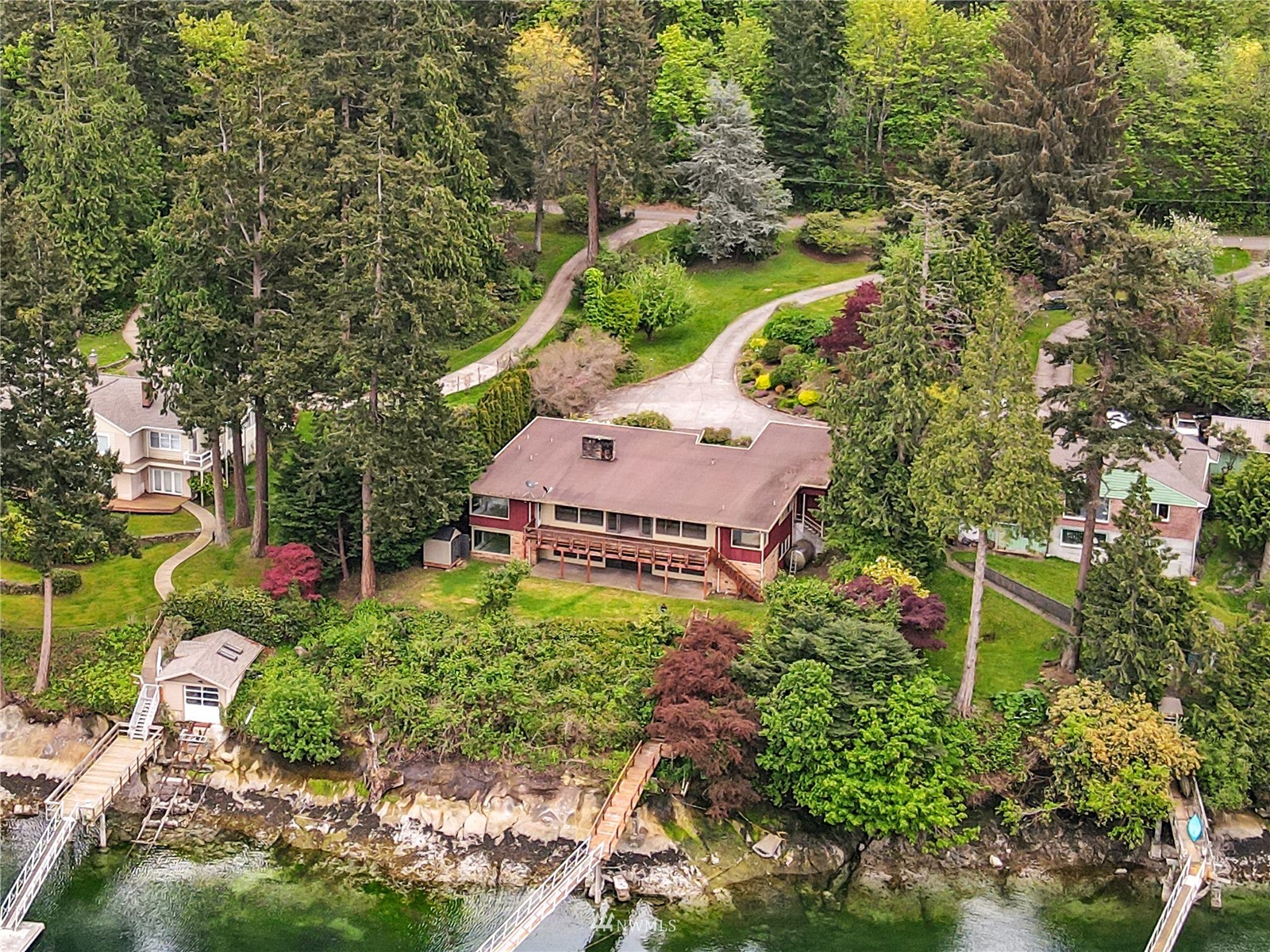 591 Pleasant Bay Road Bellingham, WA 98229 - Photo 2 of 40 an aerial view of a house with a yard and greenery