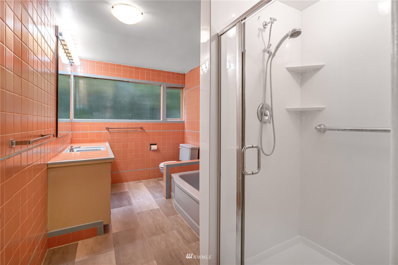 591 Pleasant Bay Road Bellingham, WA 98229 - Photo 23 of 40 a bathroom with a sink a toilet and shower