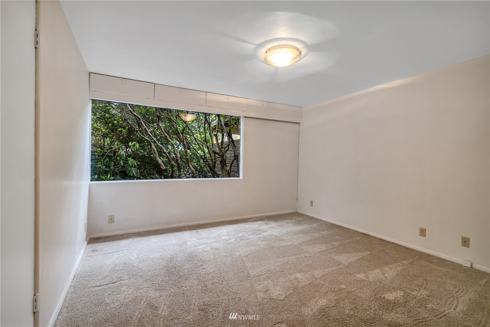 591 Pleasant Bay Road Bellingham, WA 98229 - Photo 24 of 40 an empty room with a window