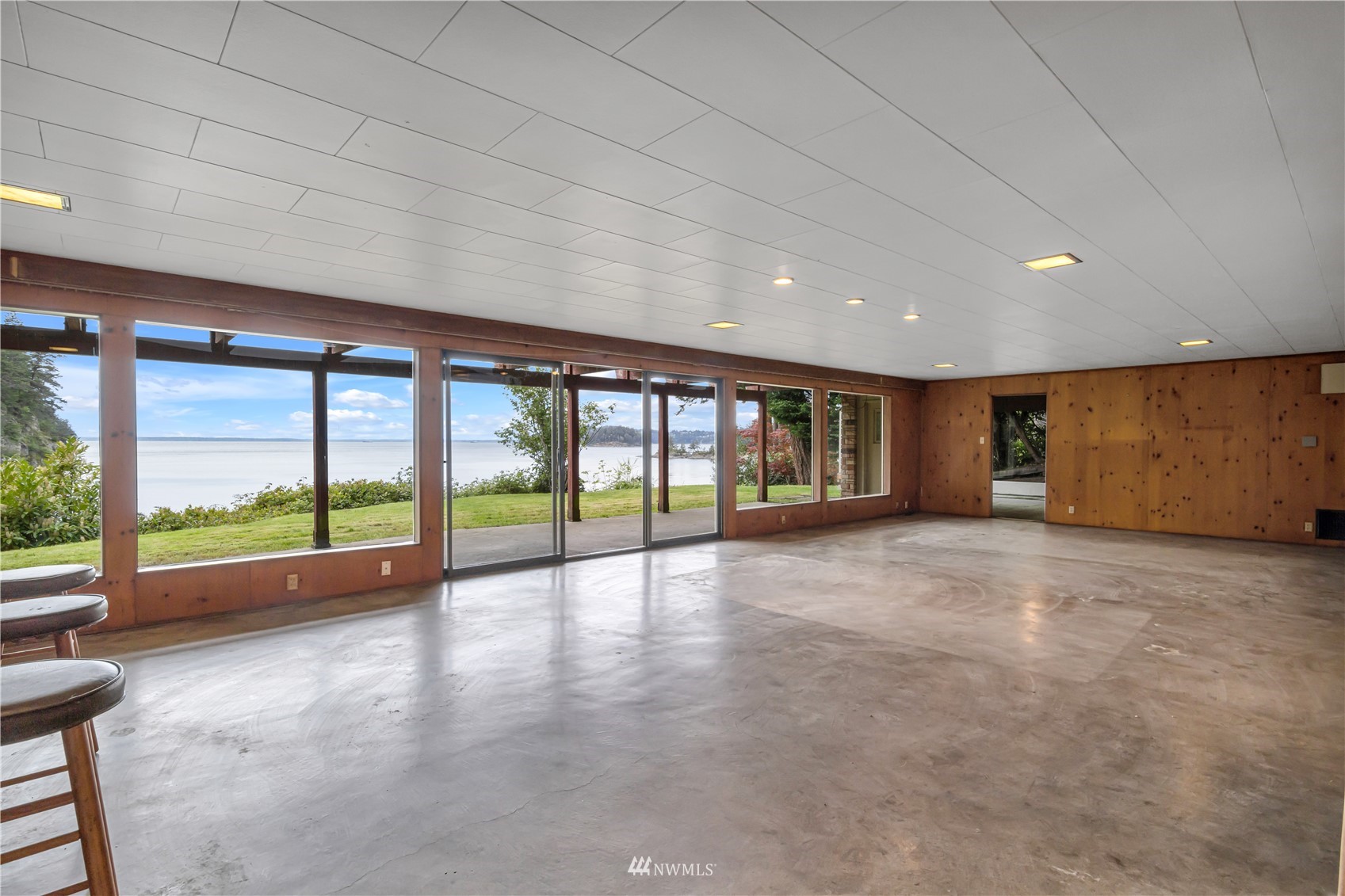 591 Pleasant Bay Road Bellingham, WA 98229 - Photo 29 of 40 a view of an empty room with a sliding door
