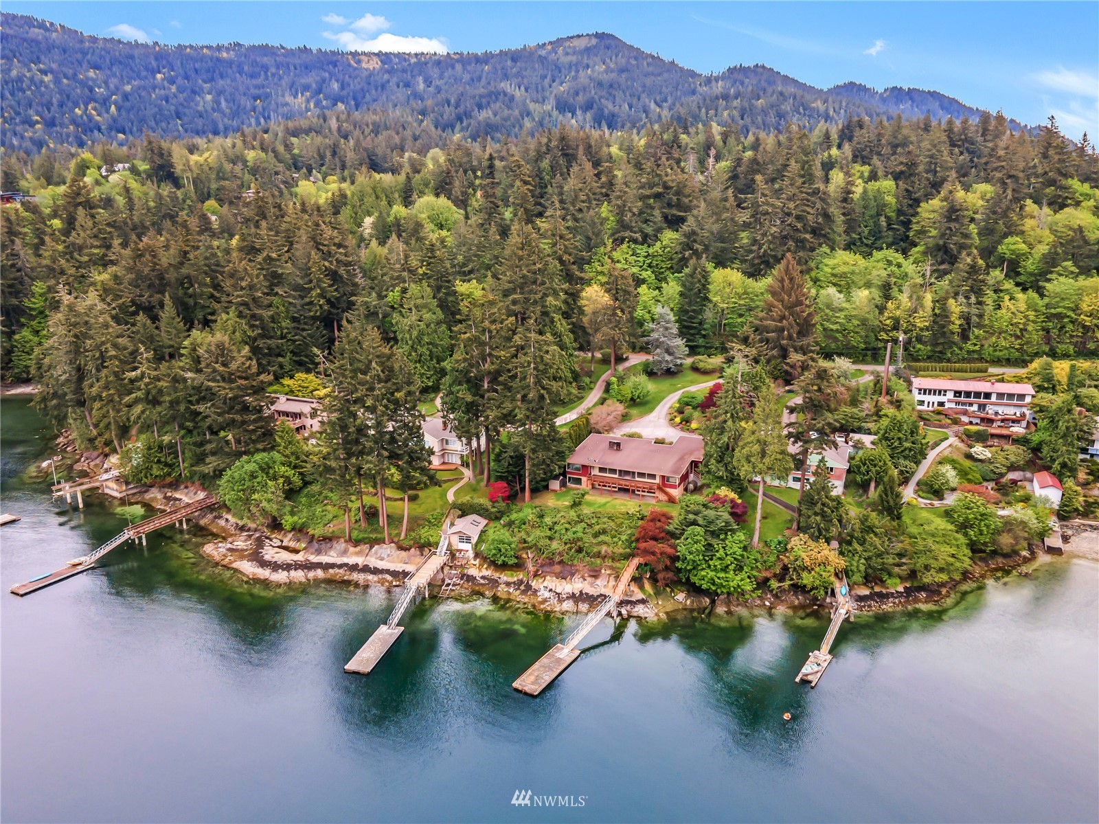 591 Pleasant Bay Road Bellingham, WA 98229 - Photo 3 of 40 view of a lake with a mountain