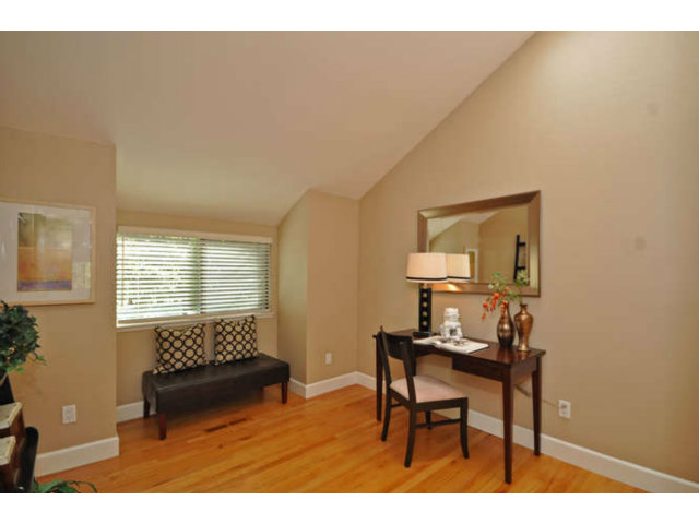 1691 Grant Road Mountain View, CA 94040 - Photo 13 of 25 a living room with furniture and a window