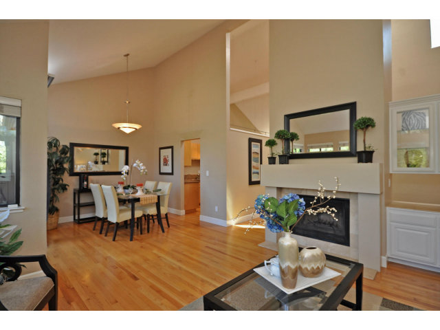 1691 Grant Road Mountain View, CA 94040 - Photo 2 of 25 a view of a dining room with furniture and wooden floor