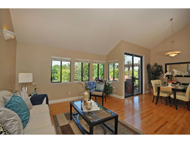 1691 Grant Road Mountain View, CA 94040 - Photo 4 of 25 a living room with furniture and a large window