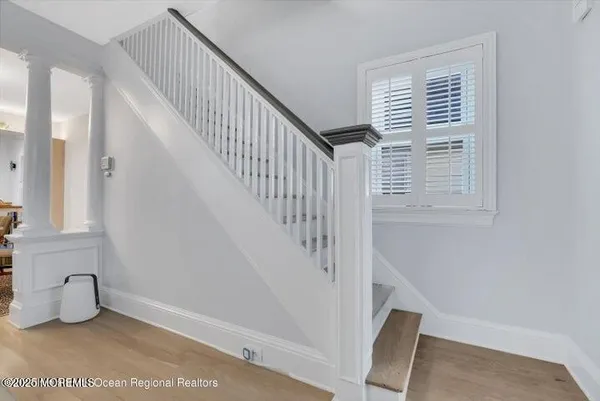 a view of entryway with stairs