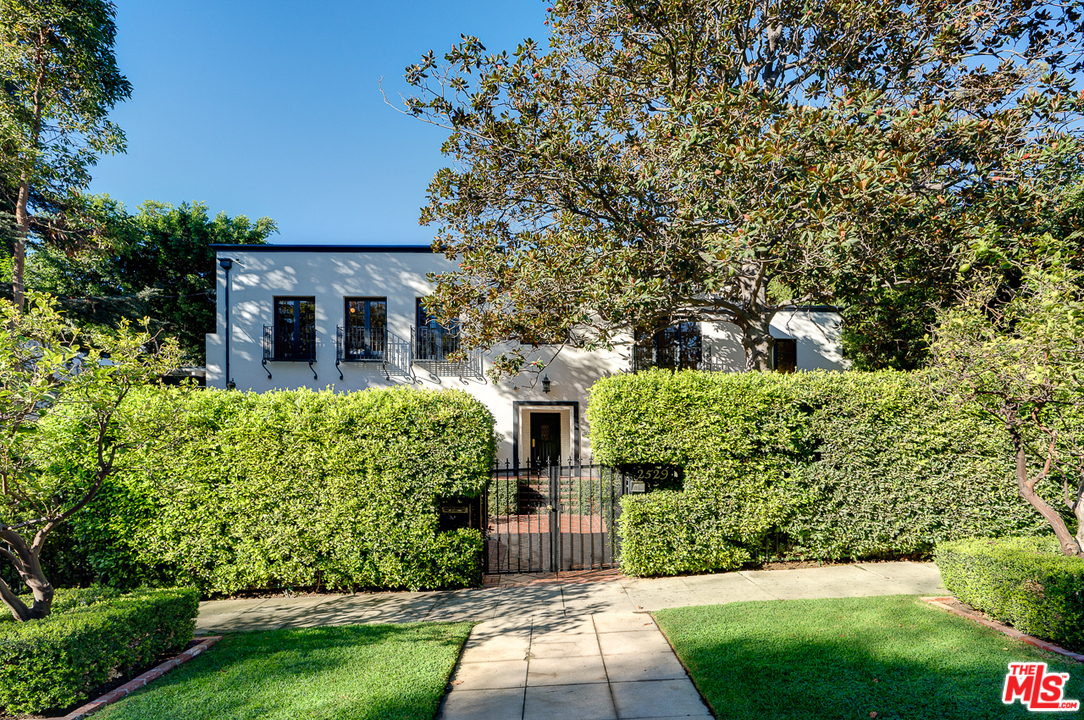 2529 North Commonwealth Avenue Los Angeles, CA 90027 - Photo 2 of 45 a front view of a house with a yard