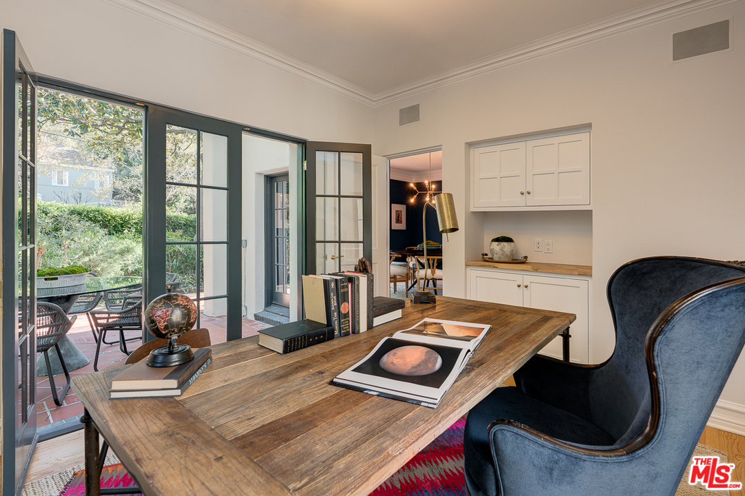2529 North Commonwealth Avenue Los Angeles, CA 90027 - Photo 15 of 45 a living room with furniture and a large window