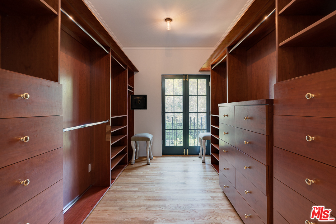 2529 North Commonwealth Avenue Los Angeles, CA 90027 - Photo 26 of 45 a view of walk in closet with clothes and shoes