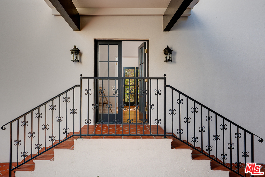 2529 North Commonwealth Avenue Los Angeles, CA 90027 - Photo 40 of 45 a view of staircase with lots of frames on wall