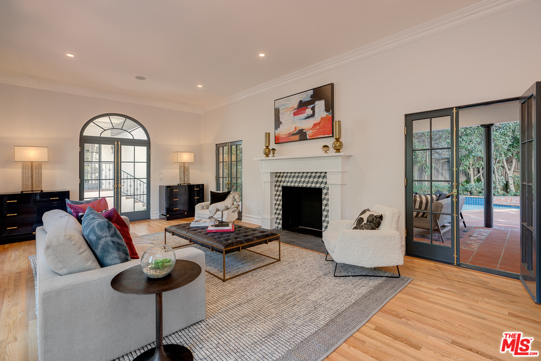 2529 North Commonwealth Avenue Los Angeles, CA 90027 - Photo 7 of 45 a living room with furniture and a fireplace